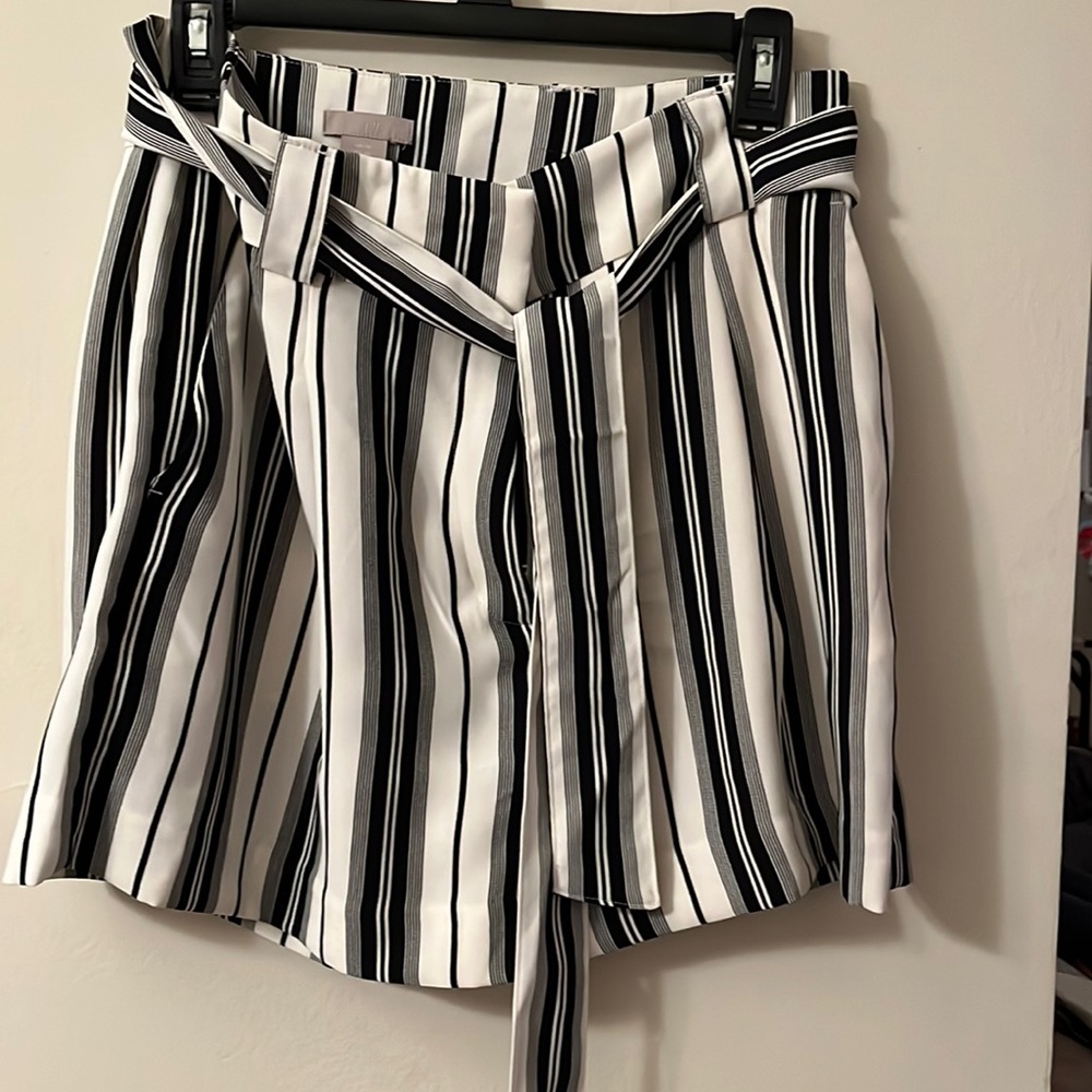 H&M. Black and white dress shorts with pockets. Silky.